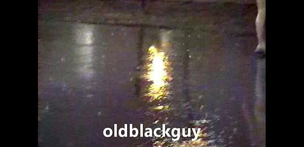  oldblackguy and gloria singing in the rain shower